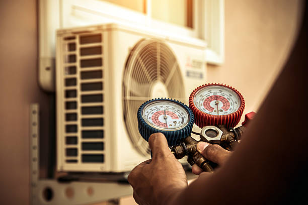 Professional Hvac technician working in Springdale, MD